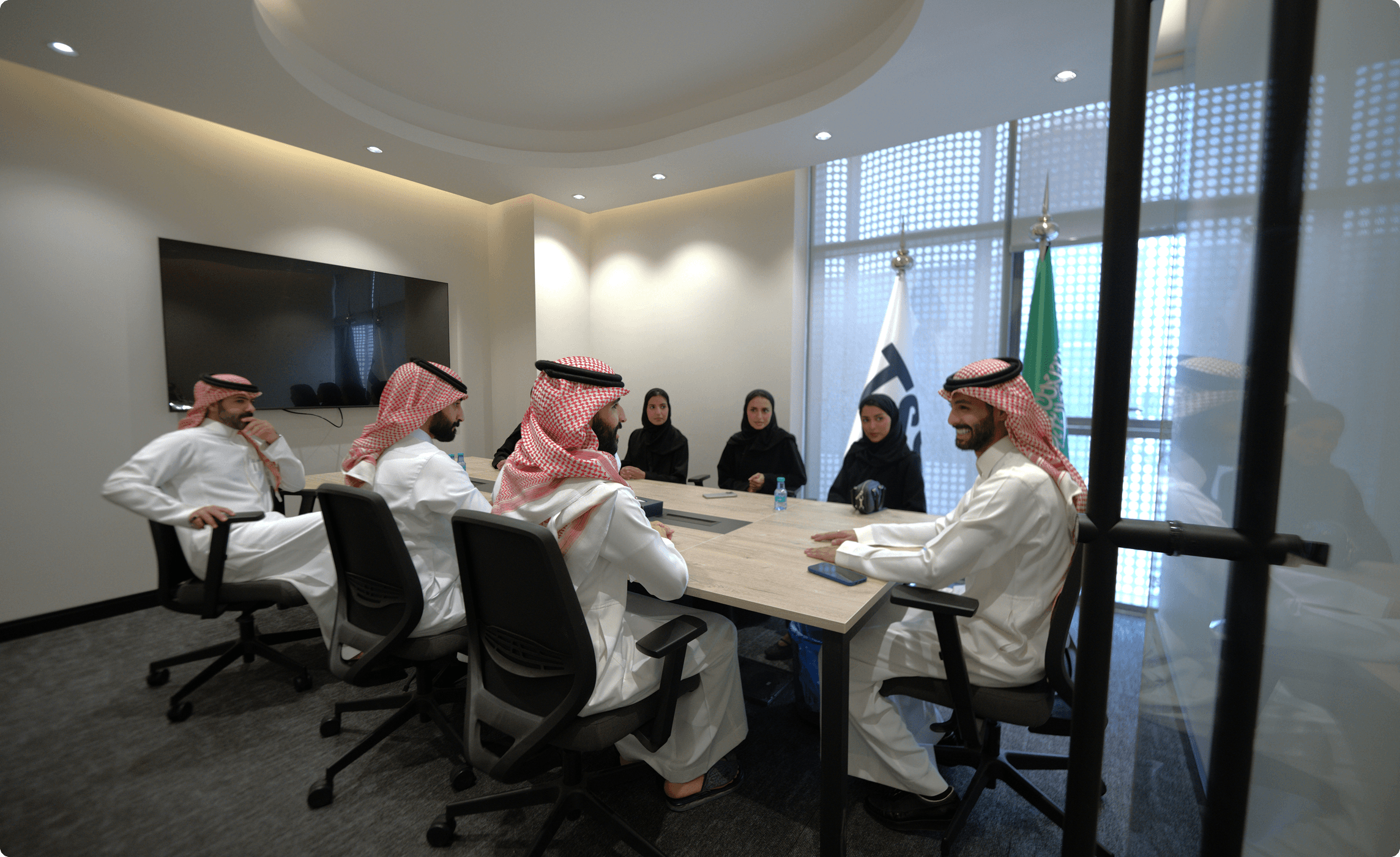 Saudi professionals collaborating in an HCE workshop